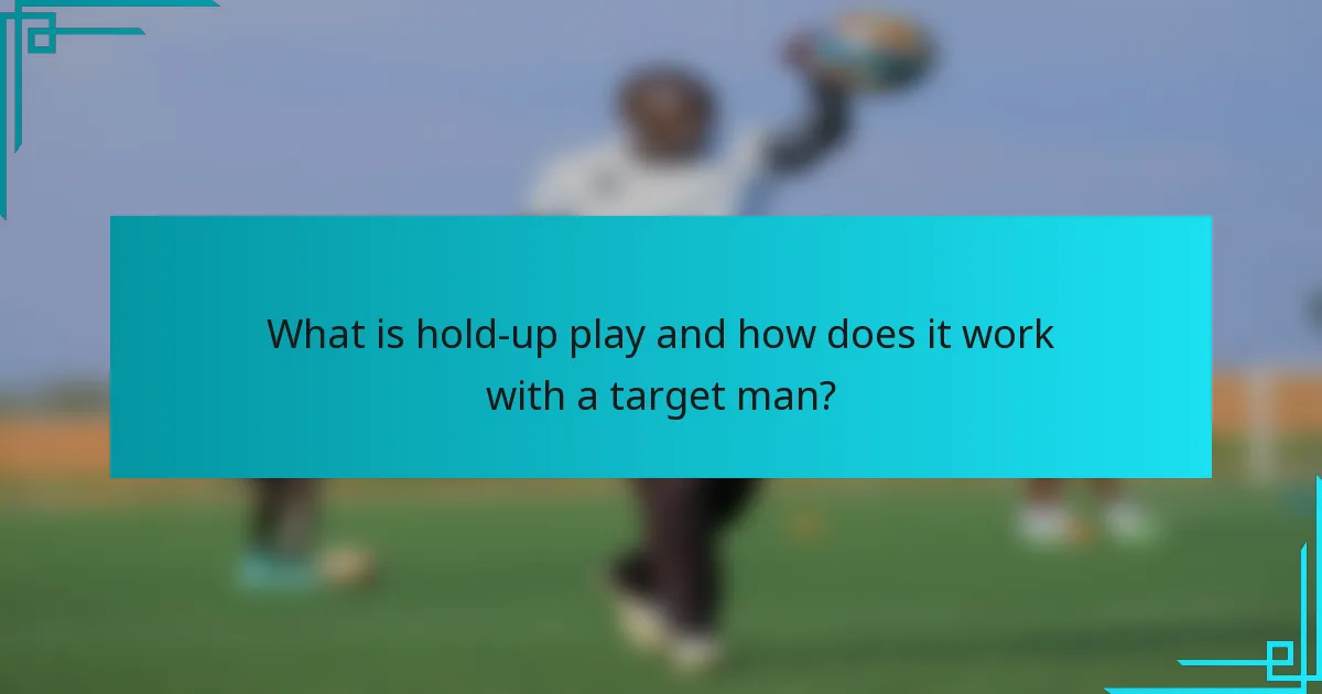What is hold-up play and how does it work with a target man?
