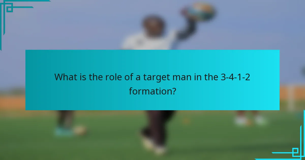What is the role of a target man in the 3-4-1-2 formation?